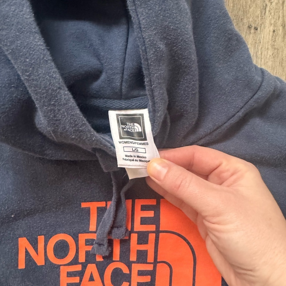 The North Face Navy Pullover Hoodie with Orange Logo - Picture 2 of 2